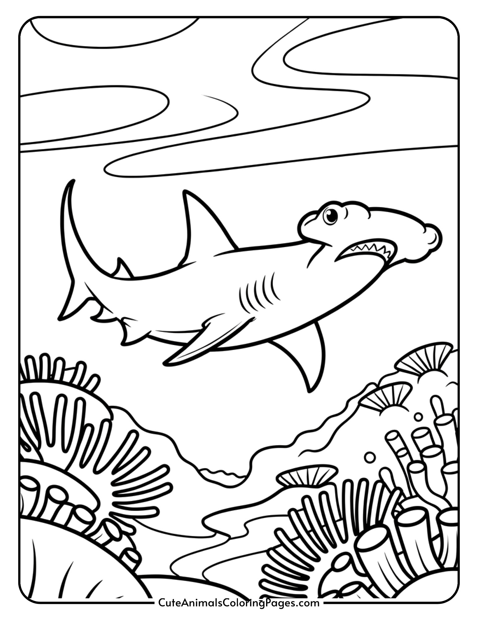 A hammerhead shark with its unique T-shaped head swims near coral formations on the ocean floor.
