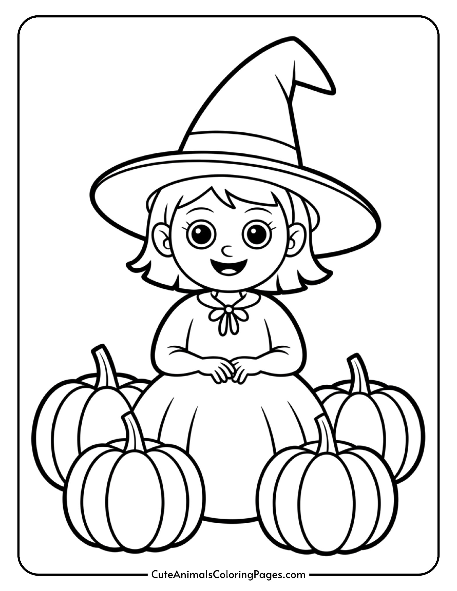 A young witch sits surrounded by several pumpkins of different sizes while wearing her pointed hat.